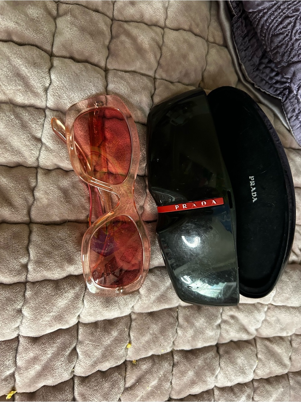 Prada translucent pink rectangular sunglasses with black case